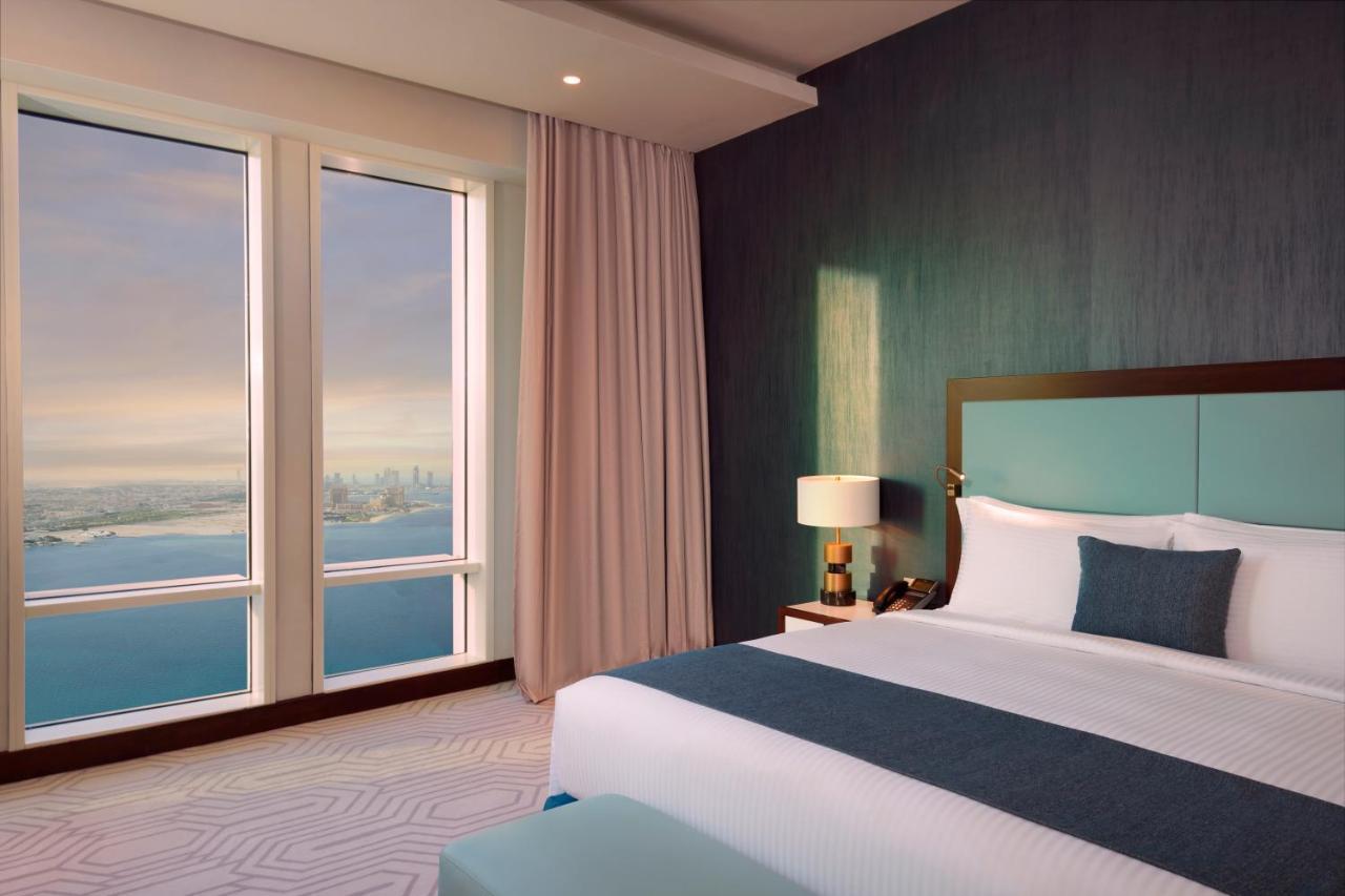 Wyndham Grand Doha West Bay Beach Exteriér fotografie A bedroom at the Address Downtown Dubai